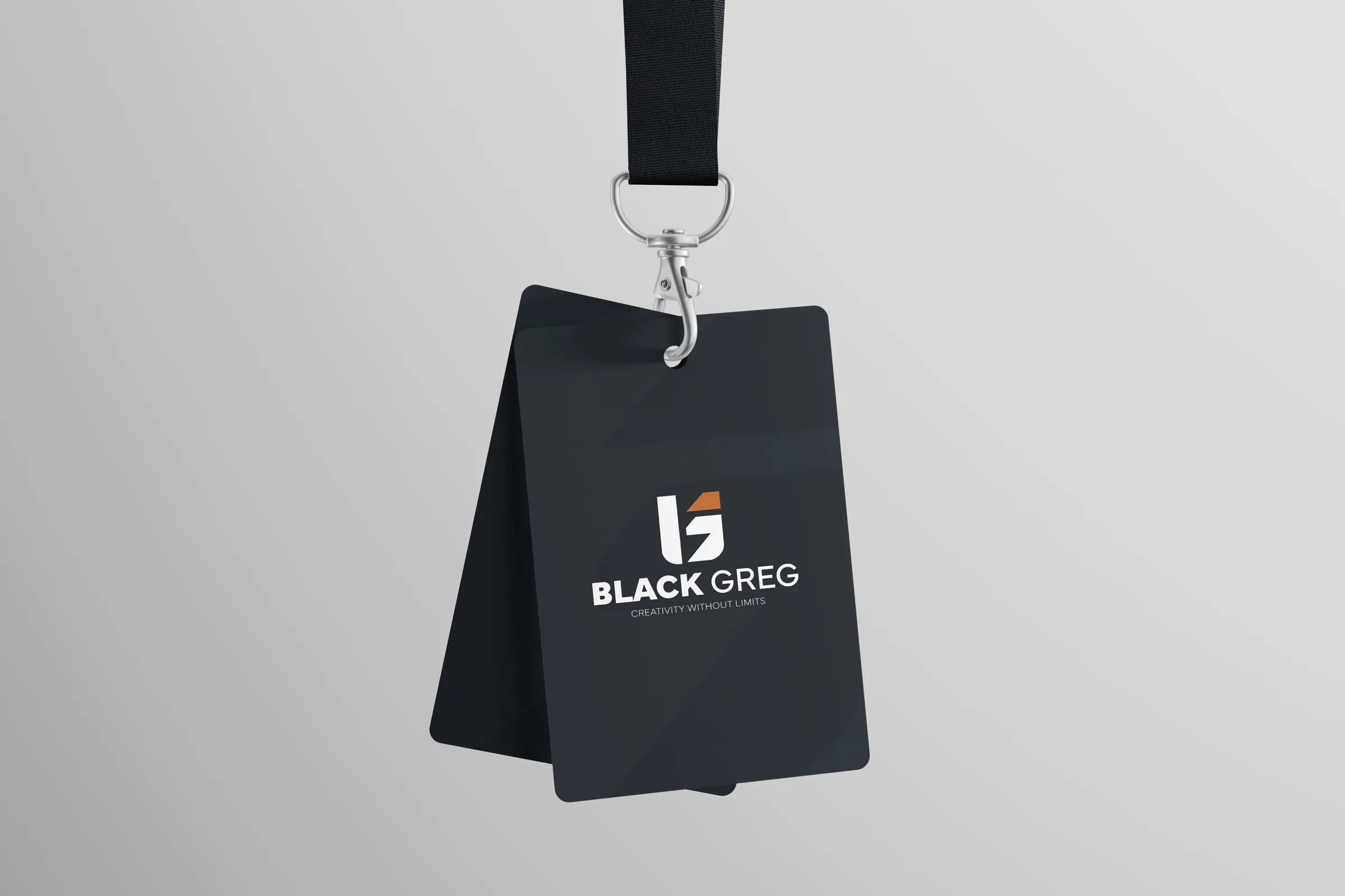 The Black Greg staff ID cards on a lanyard